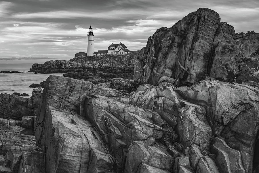Black And White Photograph - Cape Elizabeth Rocky Coast and Portland Head Light in Black and White by Gregory Ballos