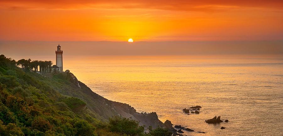 Sunset Photograph - Cape Spartel Lighthouse At Sunset by Jan Wlodarczyk