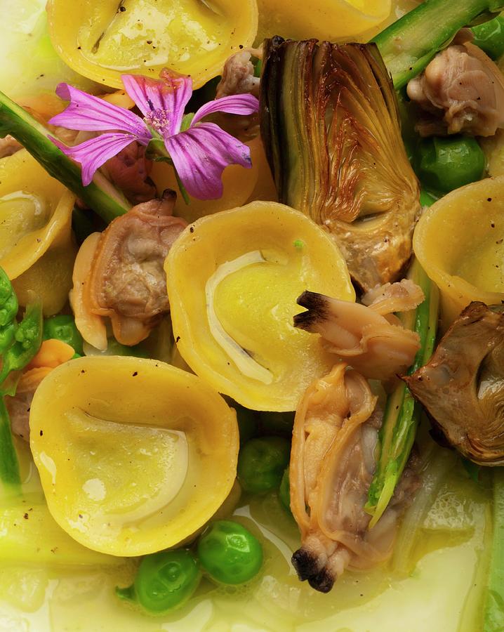 Cappelletti Pasta With Mussels, Artichokes And Peas detail Photograph by Paolo Della Corte