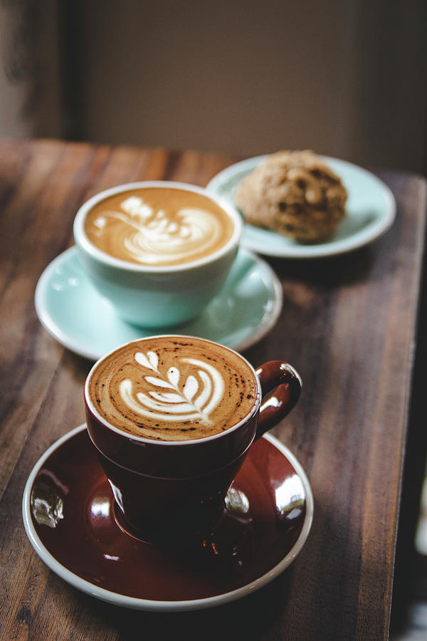 Cappuccinos In Colourful Cups And Cookies Photograph by Mel Boehme ...