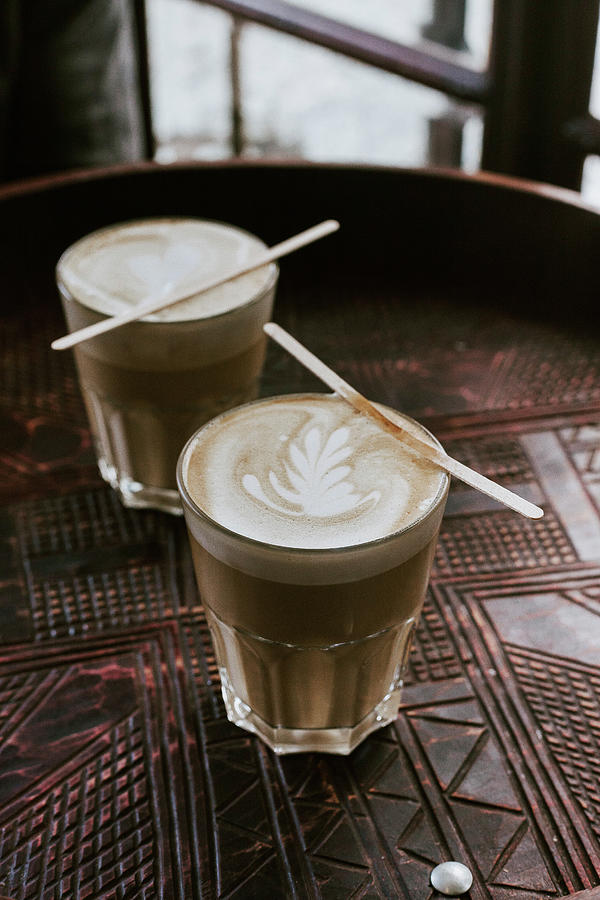 Cappuccinos With A Milk Foam Pattern Photograph by Sophia Schillik