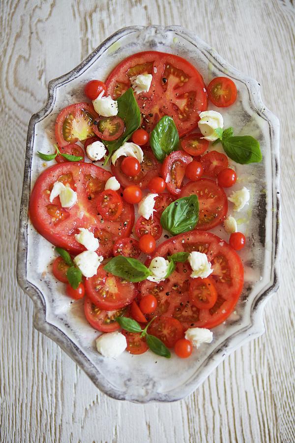 Caprese Salad With A Variety Of Tomatoes, Mozzarella And Basil Photograph by Moe Kafer Photography