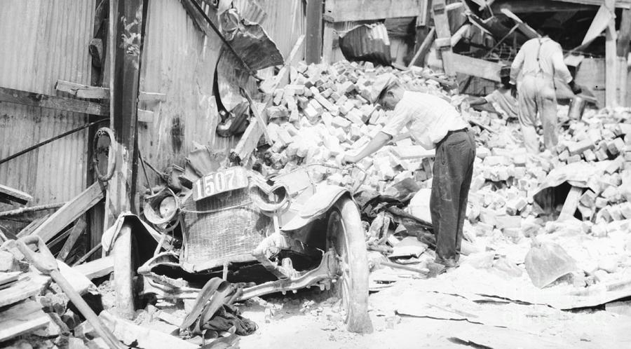 Car Buried Under Pile Of Bricks Photograph by Bettmann