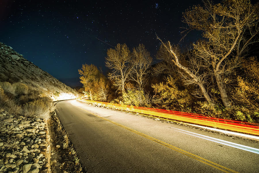 Car Trails On Road At Night In Sierra Mountains California Photograph by Alex Grichenko