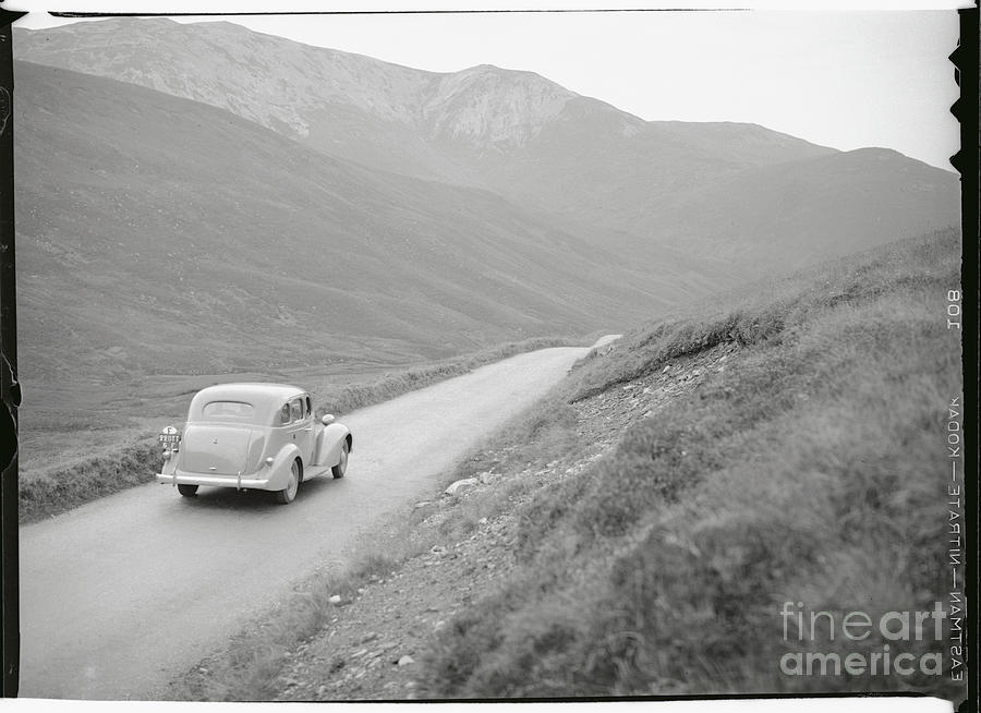 Car Traveling In The Highlands Photograph by Bettmann
