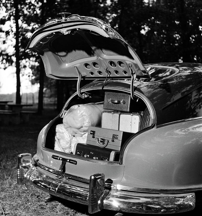 Car Trunk with Luggage Photograph by Joseph Scherschel