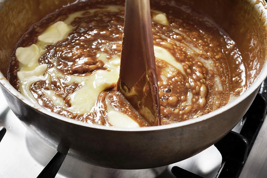 Caramel Being Heated In A Pan Photograph by Lode Greven Photography