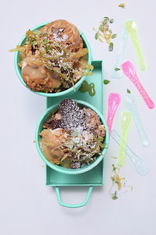 Caramel Ice Cream With Thyme Caramel, Caramel Sauce And Chocolate In Turquoise Pots With Ice Cream Spoons Photograph by Elli Briest