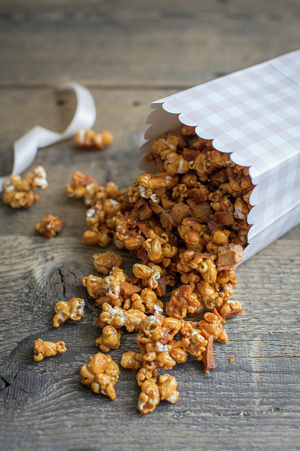 Caramel Popcorn With Dried Apple Pieces Photograph by Anne Faber