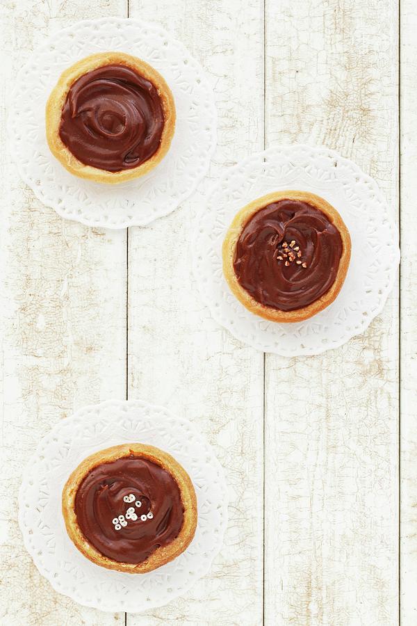 Caramel Tartlets With Chocolate Glaze Photograph by Jane Saunders