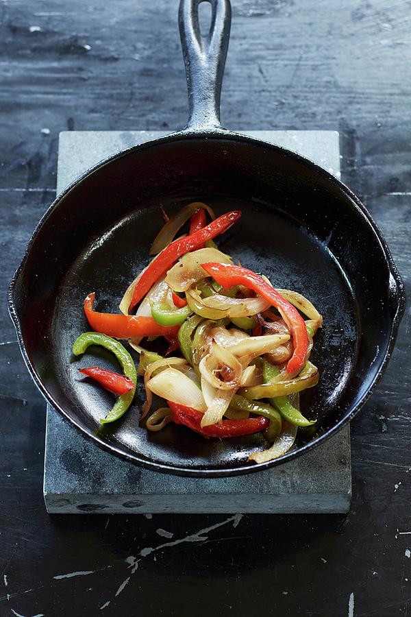 Caramelised Onions And Peppers In A Castiron Pan Photograph by Michael S. Harrison Fine Art