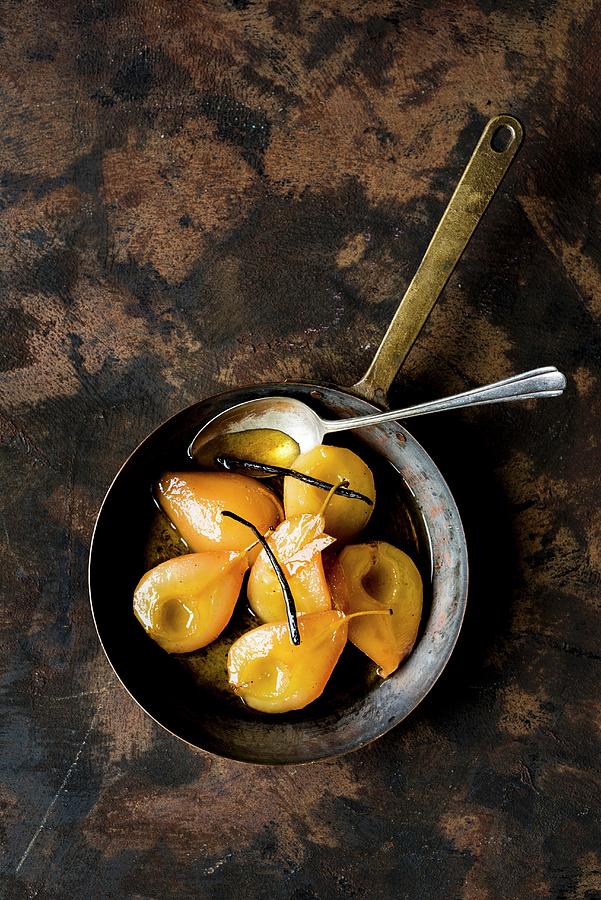 Caramelised Poached Pears In A Pan seen Above Photograph by Hein Van Tonder