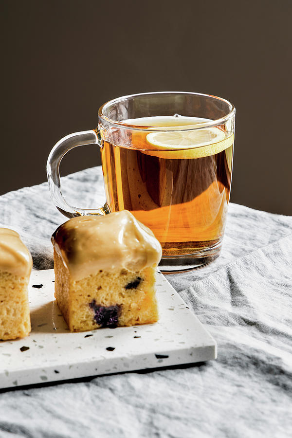 Caramelized Chocolate And Blueberry Mini Pound Cakes And Cup Of Black Tea. Photograph by Alla Machutt