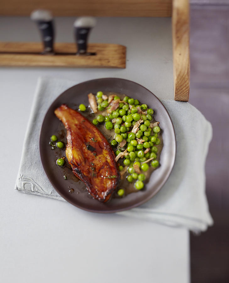 Caramelized Veal Rib Roast With Peas And Bacon Photograph by Viel