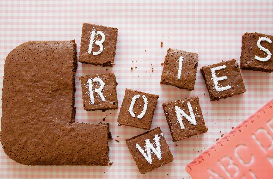 Cardamom Brownies Decorated With Letters Photograph by Studio27neun