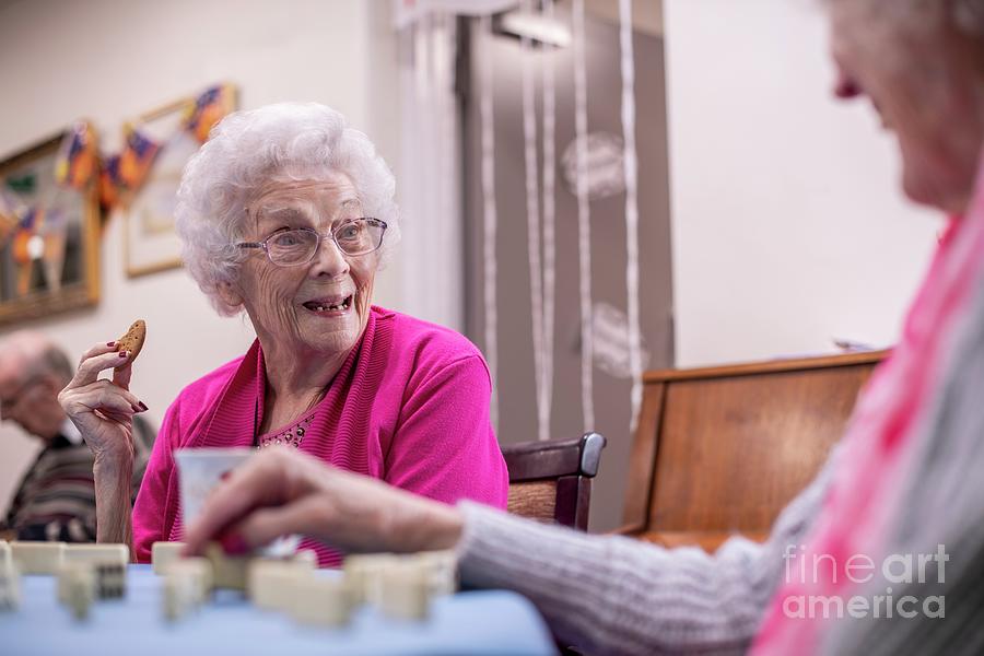 Care Home Domino Session Photograph by Jim Varney/science Photo Library
