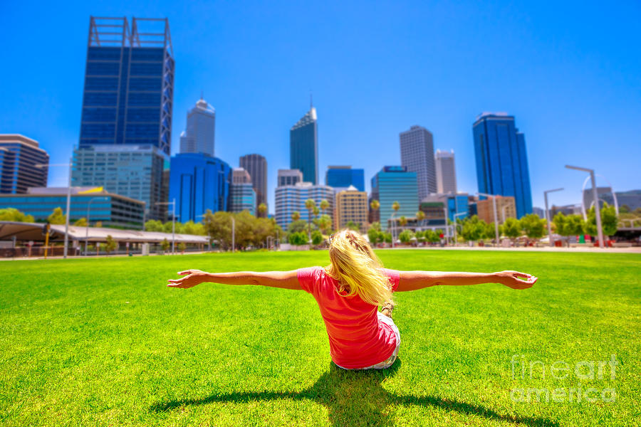 Carefree woman in Perth Skyline Photograph by Benny Marty