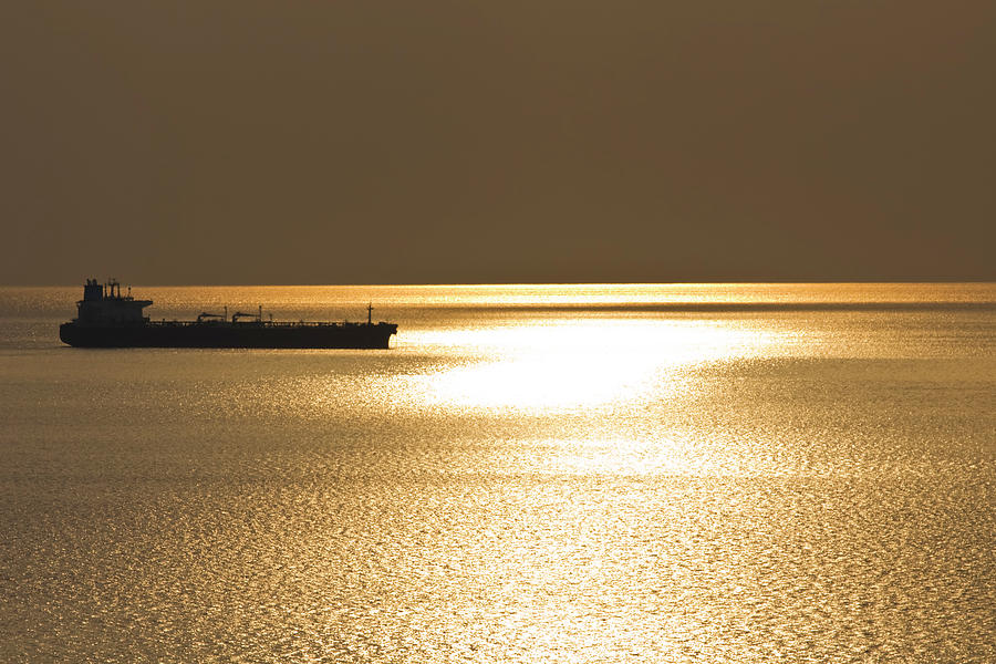 Cargo Ship In The Sunset Photograph by Gaspr13