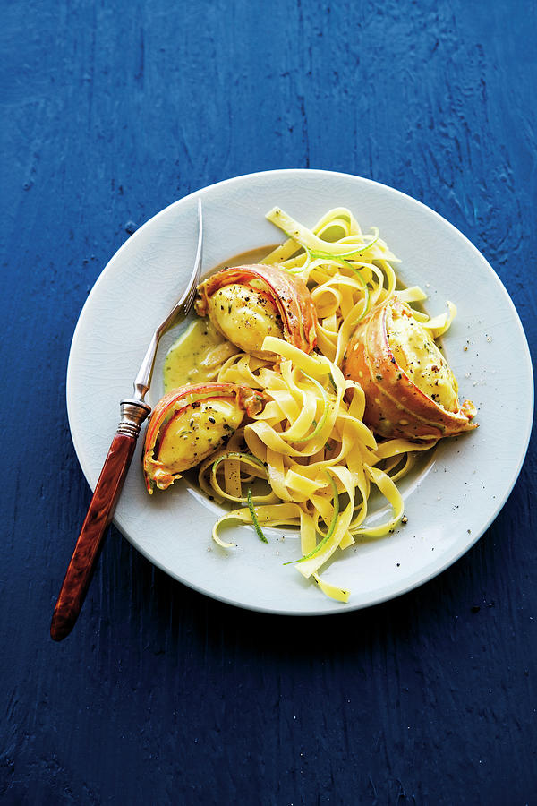 Caribbean Coconut And Curry Lobster With Mango Noodles Photograph by Michael Wissing