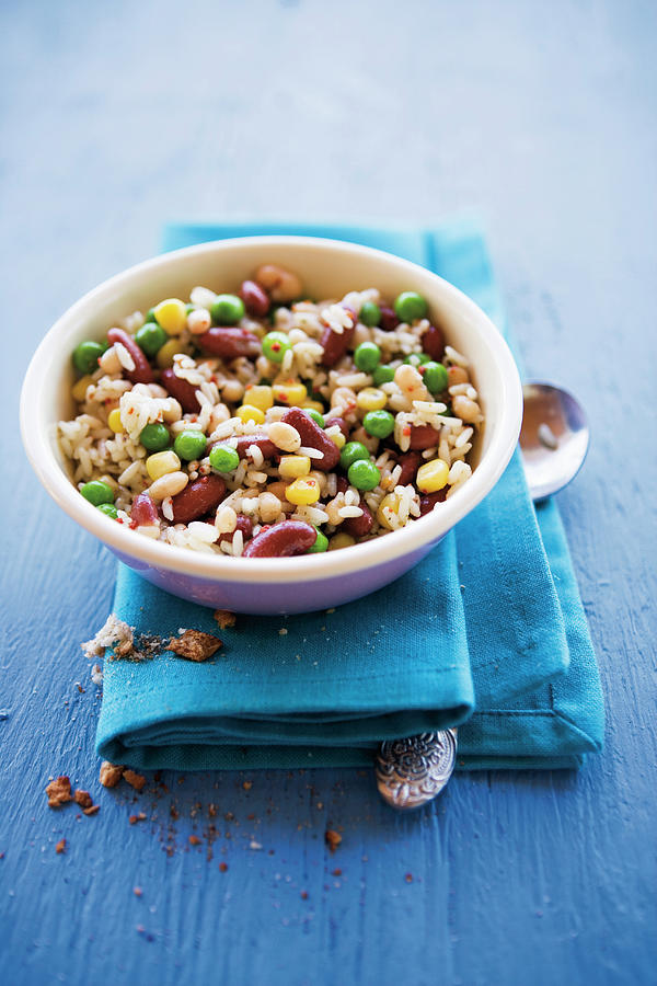 Caribbean Rice With Beans, Peas And Sweetcorn Photograph by Michael Wissing