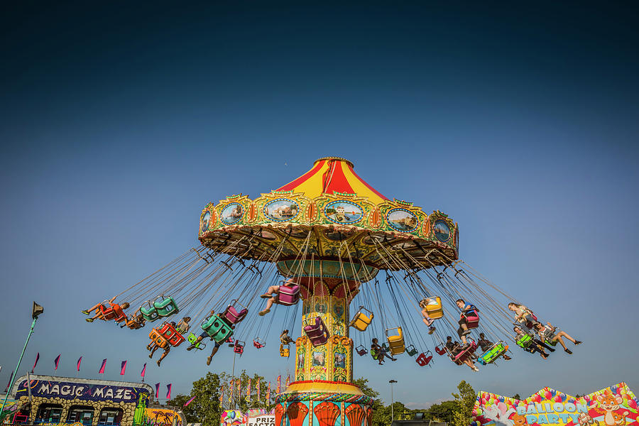 Carousel Swings At the fair Photograph by Don Johnston | Fine Art America