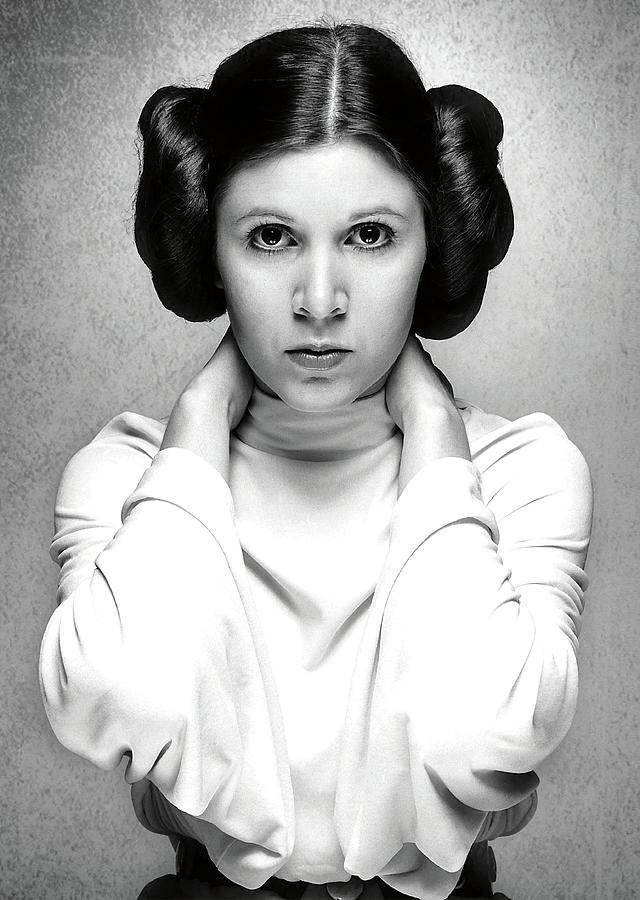 CARRIE FISHER in STAR WARS EPISODE IV-A NEW HOPE -1977-. Photograph by Album