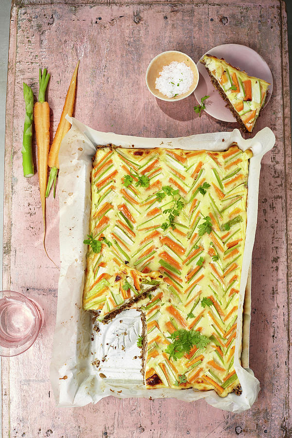 Carrot And Asparagus Tart With Pumpernickel Photograph by Ulrike Stockfood Studios / Holsten