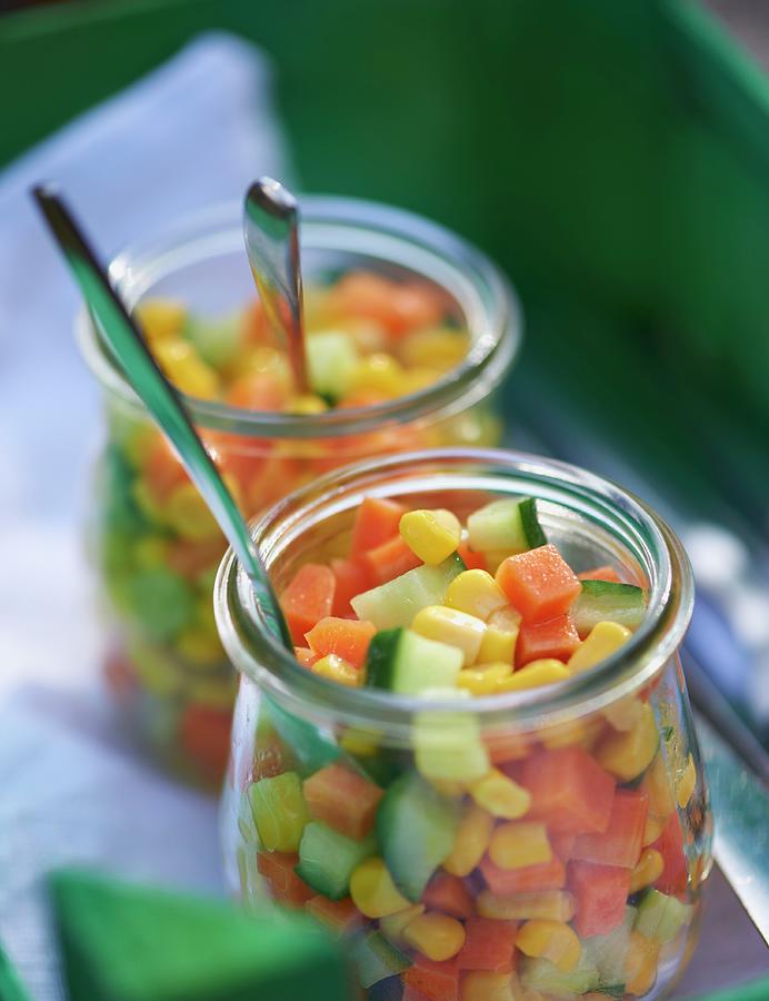 Carrot And Cucumber Salad With Sweetcorn For A Spring Picnic Photograph by Hannah Kompanik