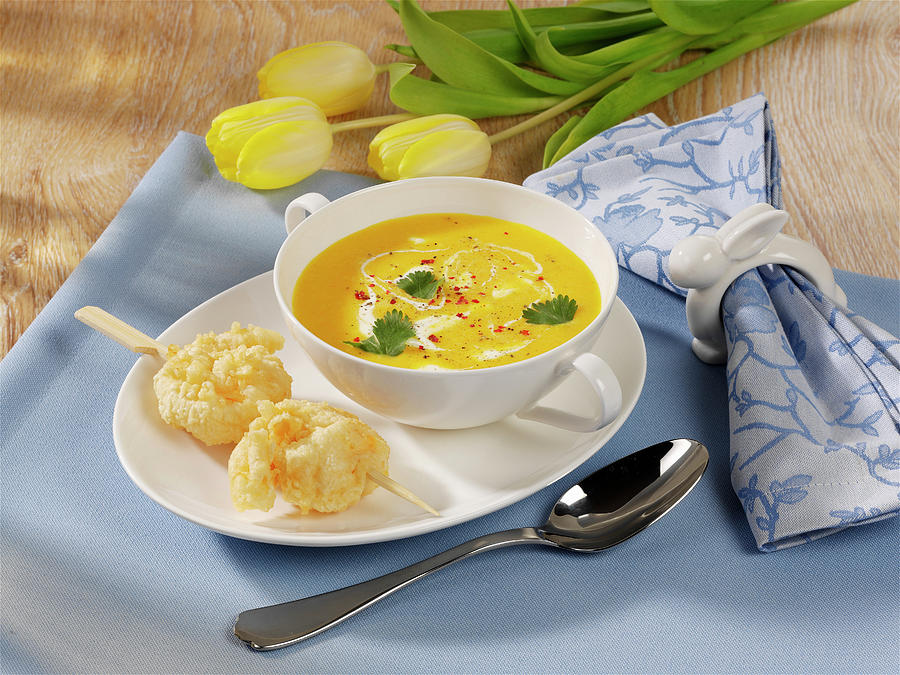Carrot And Mango Soup With Prawn Skewers Photograph by Photoart / Stockfood Studios