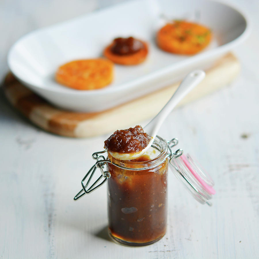Carrot And Onion Chutney In A Glass And On Sweet Potato Slices Photograph by Mariola Streim