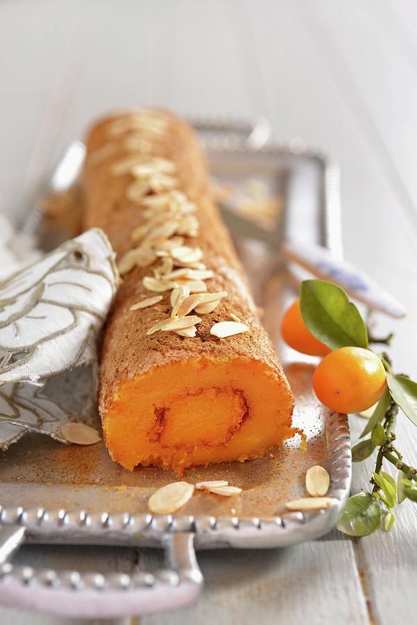 Carrot And Orange Roulade With Flaked Almond portugal Photograph by Great Stock!
