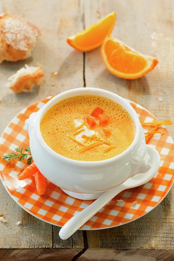 Carrot And Orange Soup With Crme Frache Photograph by Birgit Twellmann