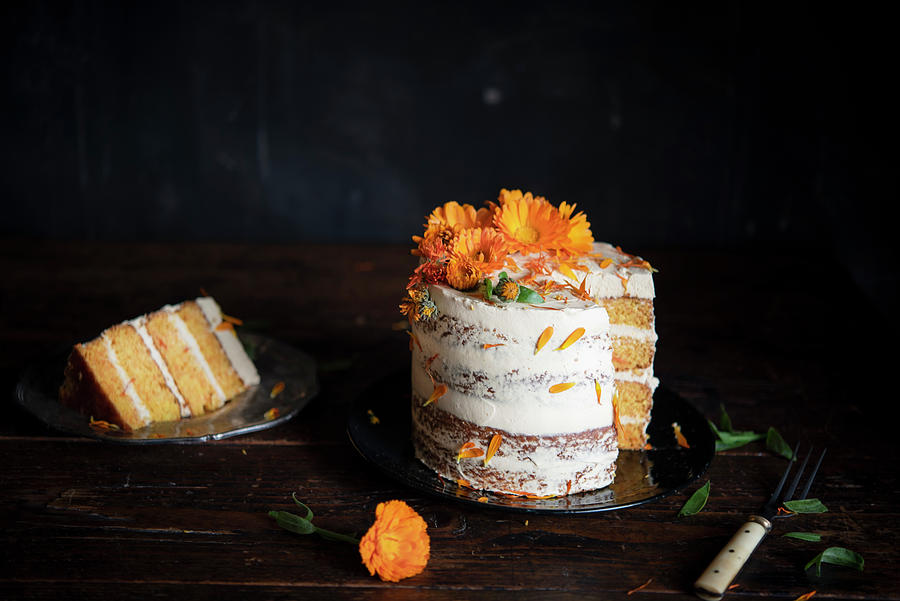 Carrot Cake Decorated With Calendulas Photograph by Justina Ramanauskiene
