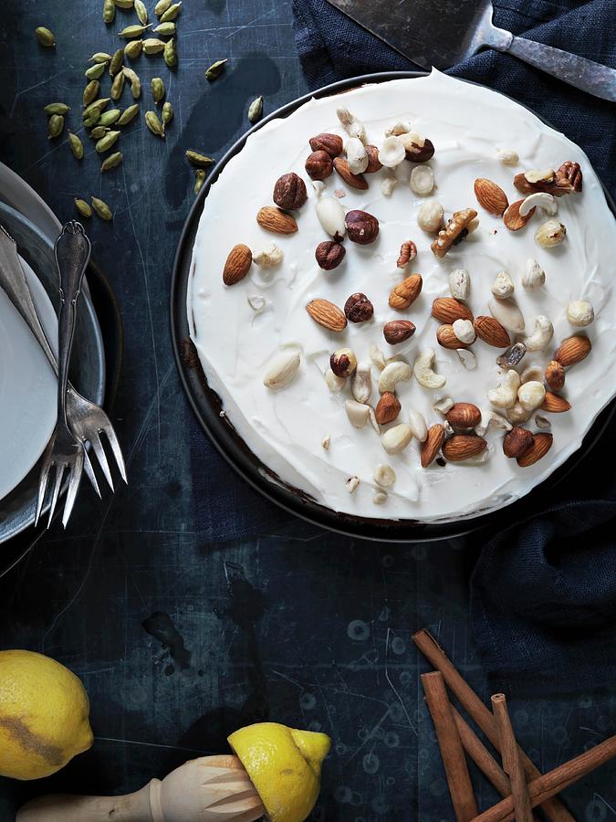 Carrot Cake With Lemon And Nuts Photograph by Martin Dyrlv