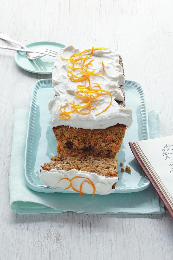 Carrot Cake With White Frosting And Orange Zest Photograph by Mona Binner Photographie