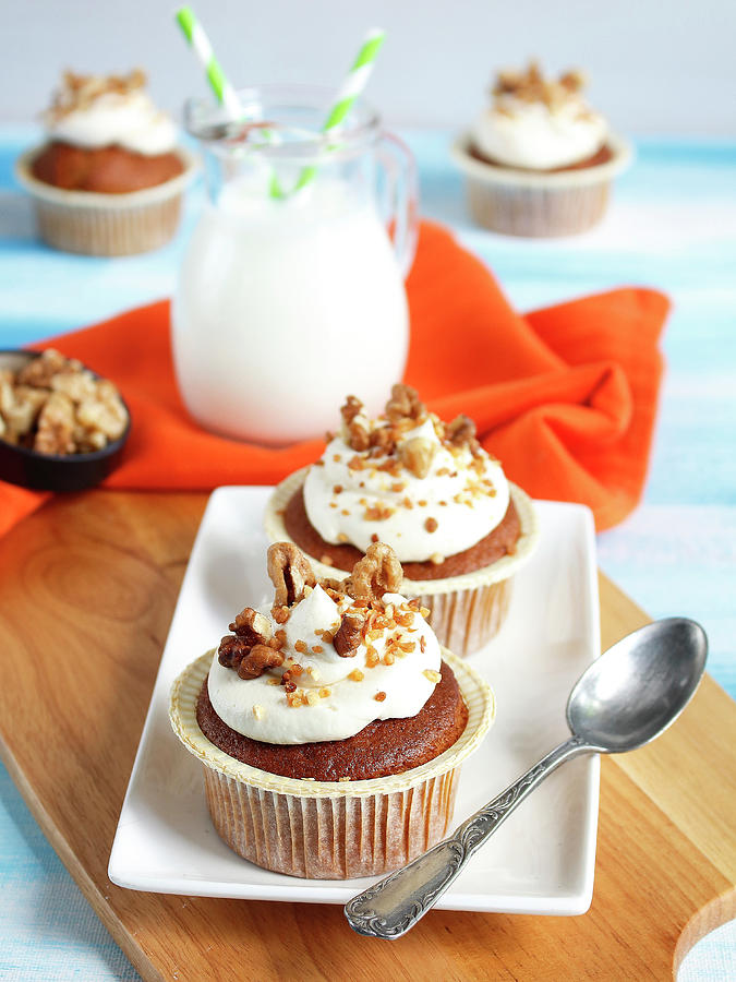 Carrot Cupcakes Topped With Cream And Walnuts Photograph by Jubault