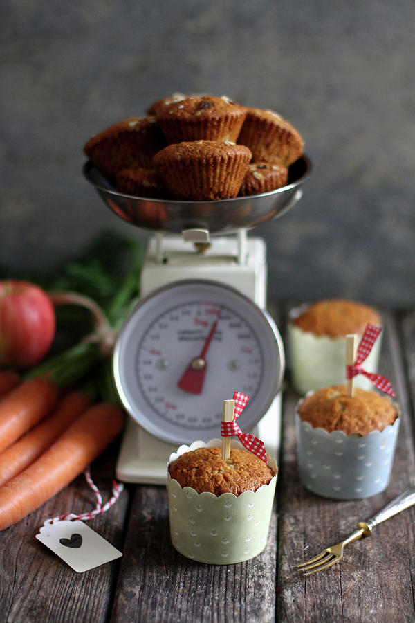 Carrot Muffins With A Pair Of Vintage Scales Photograph by Sylvia E.k Photography