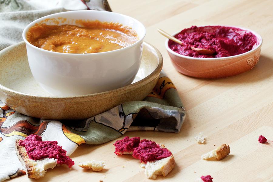 Carrot Pure With Tamari And Peanuts, Beetroot Dip And Pieces Of White Bread Photograph by Chaudron Pastel
