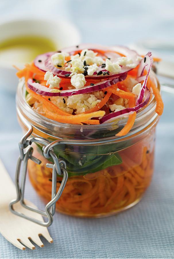 Carrot Salad With Nuts, Feta, Spinach, Red Onions, Olive Oil And Black Sesame In A Mason Jar Photograph by Valeria Aksakova
