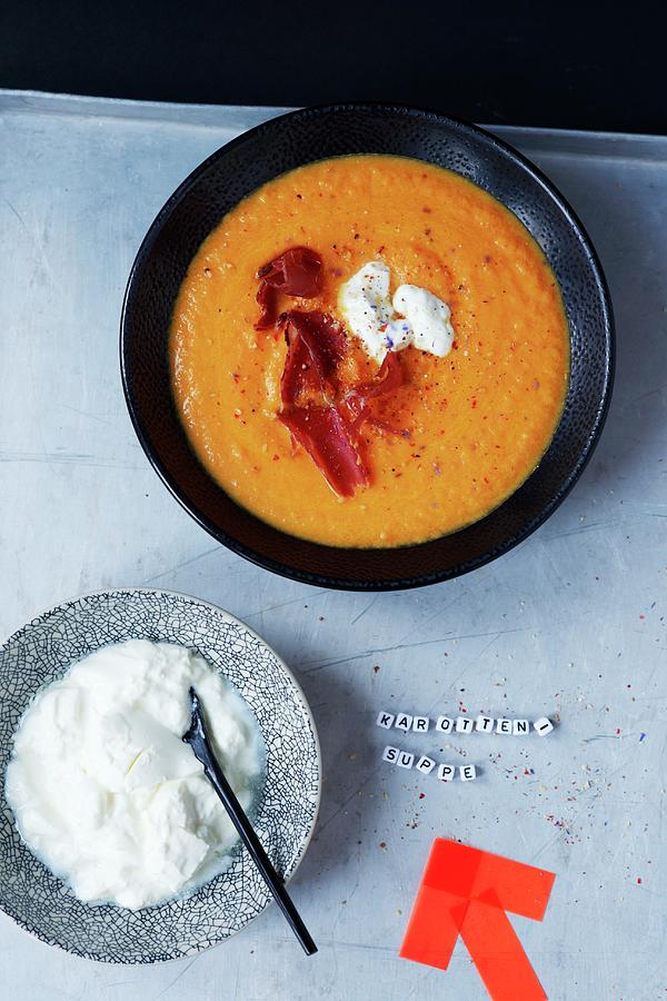 Carrot Soup With Bresaola And Sour Cream Photograph by Brinkop, Maria