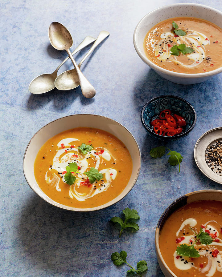 Carrot Soup With Coconut Milk, Red Chillies, Cilantro, White And Blach Sesame Seeds Photograph by Zuzanna Ploch