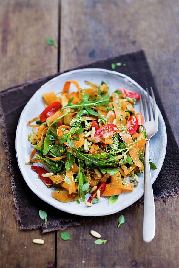 Carrot Tagliatelle With Tomatoes And Rocket Photograph by Brigitte Sporrer