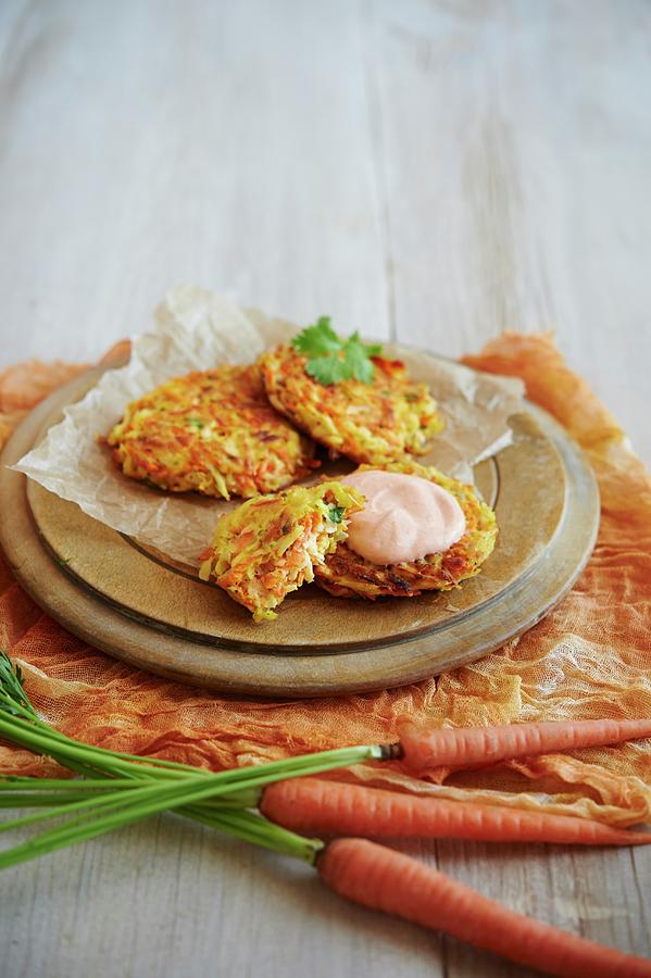 Carrots And Parsnips Fritters With Sriracha Crme Frache Photograph by Greg Rannells