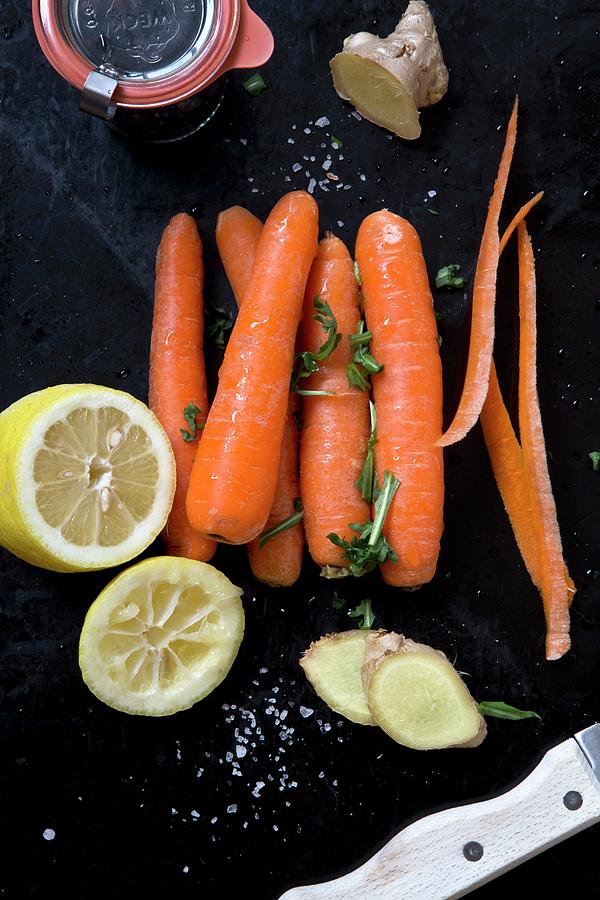 Carrots, Ginger And Lemons Photograph by Catja Vedder