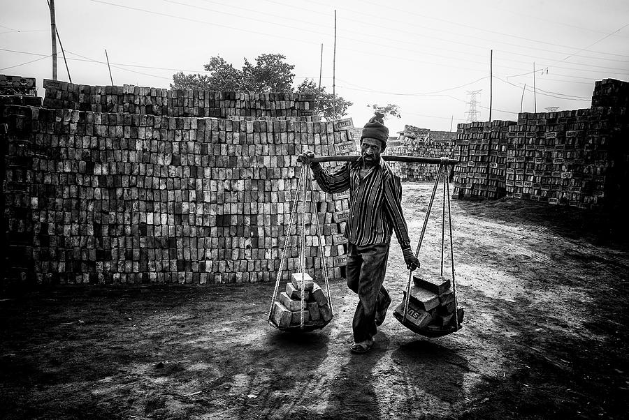 Street Photograph - Carrying Bricks - Bangladesh by Joxe Inazio Kuesta Garmendia