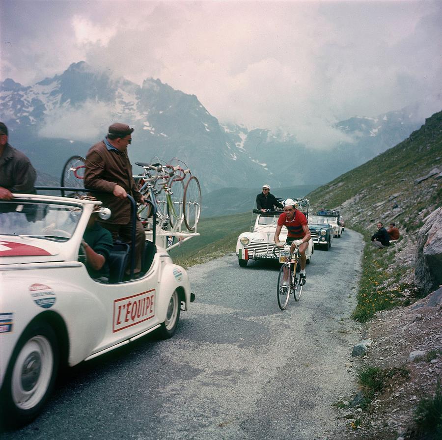 Cars Around A Cyclist During The Tour Photograph by Keystone-france
