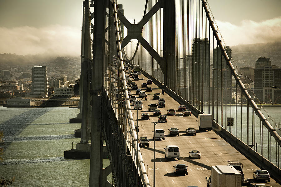 Cars Crossing The Bay Bridge Photograph by Halbergman