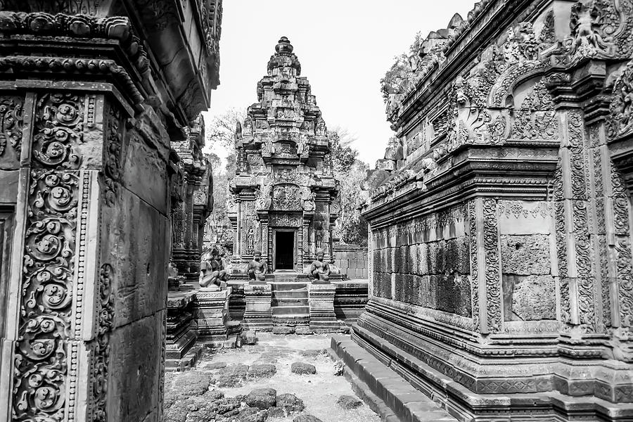 Carvings in courtyard of Banteay Srei, Siem Reap, Cambodia in Black and White Photograph by Karen Foley