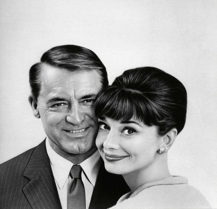 CARY GRANT and AUDREY HEPBURN in CHARADE -1963-. Photograph by Album