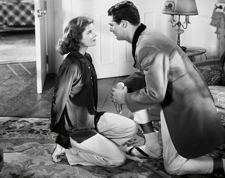 CARY GRANT and KATHARINE HEPBURN in BRINGING UP BABY -1938-. Photograph by Album
